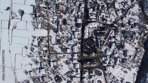 Winter drone flight over Mestia. Gerorgia. 
Next to Hatsvali Ski resort, Uschba Peak and Tetnuldi Peak photo