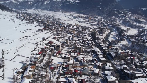 Winter drone flight over Mestia. Gerorgia. 
Next to Hatsvali Ski resort, Uschba Peak and Tetnuldi Peak photo