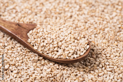 close up of sesame seeds in spoon background