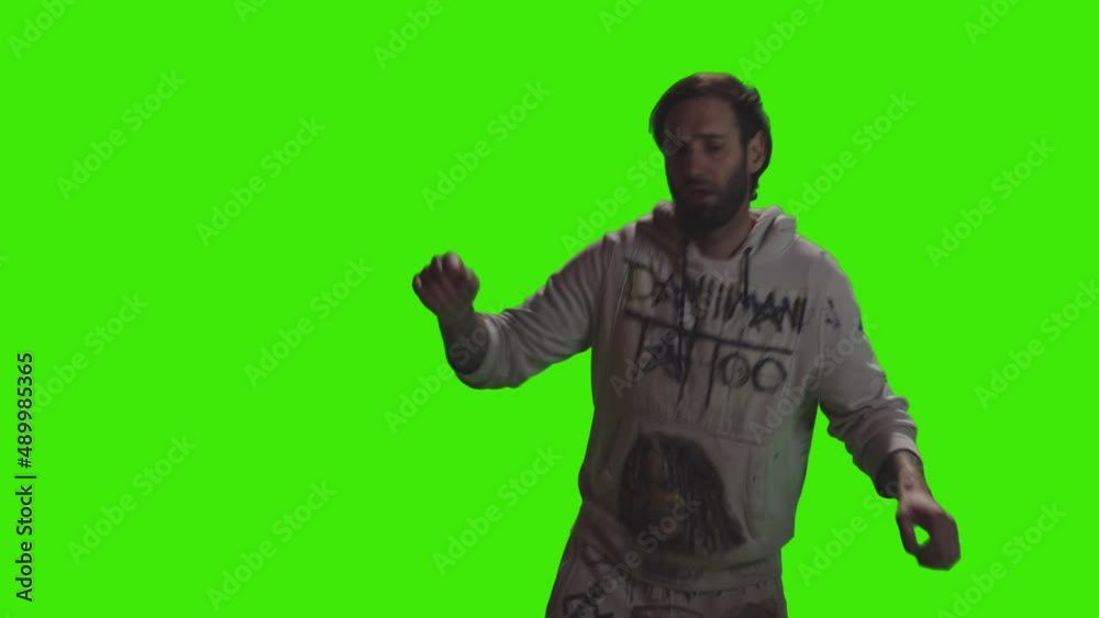 A young boy is dancing happily on greenscreen A young boy is dancing happily on greenscreen
