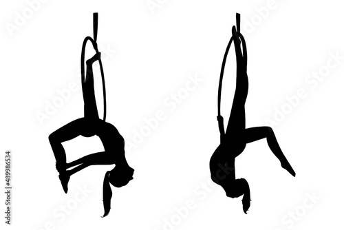 Aerial female gymnast silhouette in hoop. Aerial gymnastics stunt. Vector illustration isolated on white background