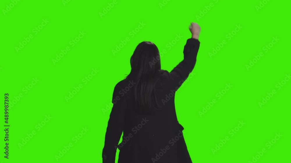 A charming teen boy is dancing with shaking his hands on greenscreen A charming teen boy is dancing with shaking his hands on greenscreen