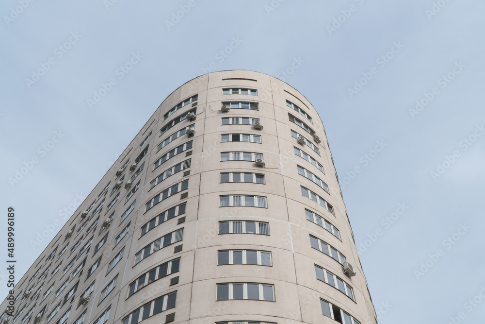 Multi storey residential complex against the sky. Urban architecture Multi storey residential complex against the sky. Urban architecture