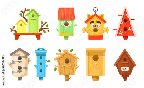 Decorative wooden spring bird houses. Garden birdhouses for feeding birds.