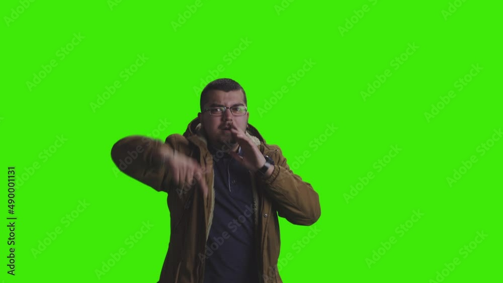 A young boy is shouting and striking alone on greenscreen A young boy is shouting and striking alone on greenscreen