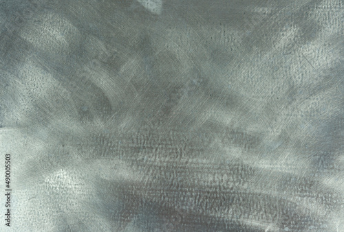 Gray abstract background. Metal sheet close up.