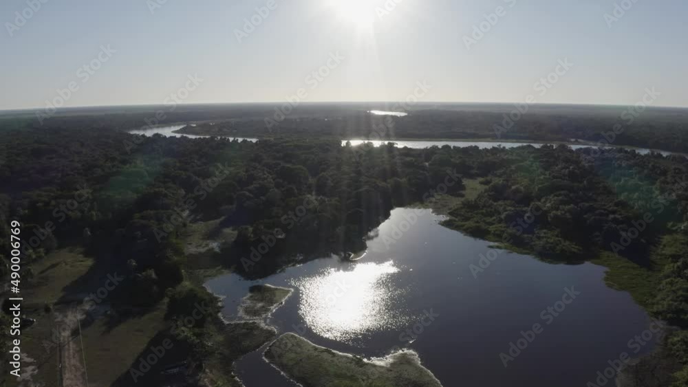 Aerial view of Pantanal full of water with sun reflection Aerial view of Pantanal full of water with sun reflection
