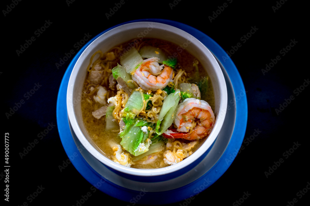 Background of food menu (stir-fried noodles with fresh shrimp), a cup for cooking at home or serving food to customers.