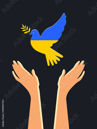 Fotografia Vertical poster with a dove of peace and the hands of the Ukrainian people in the struggle for peace on a black background