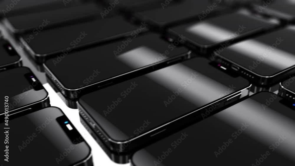 a large number of phones on the assembly line. the concept of producing phones and gadgets in large quantities with a bokeh effect. cyclic animation a large number of phones on the assembly line. the concept of producing phones and gadgets in large quantities with a bokeh effect. cyclic animation