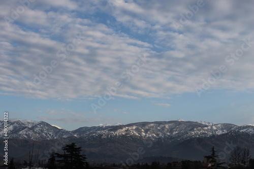 snow covered mountains and sky © Giorgi