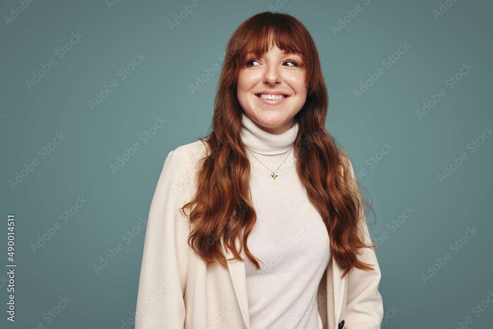 Woman smiling cheerfully in a studio Woman smiling cheerfully in a studio