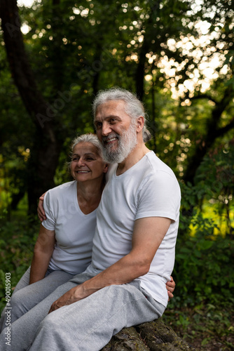 A beautiful senior couple is spending time in the nature