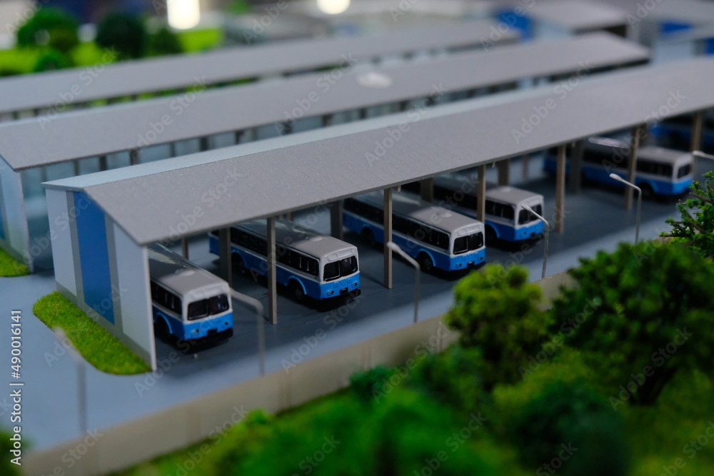 Plastic layout - bus station and garages surrounded by trees Stock ...