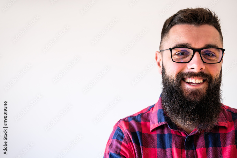 Fototapeta premium Portrait of happy man who is smiling. Copy space on image for your text or advert.