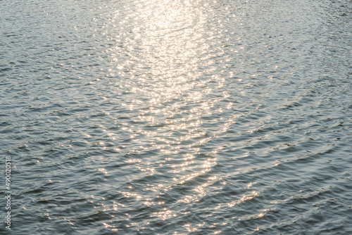 sunlight reflecting on water surface