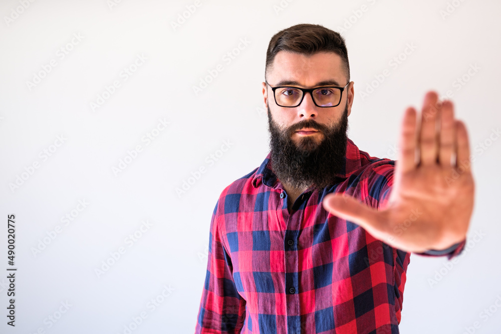 Naklejka premium Portrait of man who threatens. Copy space on image for your text or advert.