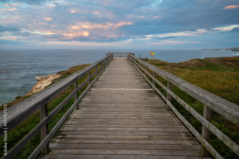 wooden observation deck on an ocean cliff