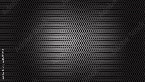 Black metal texture steel background. Perforated sheet metal. Aluminum wire mesh material texture Steel grid with round holes on black background