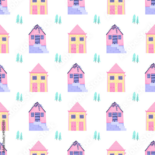 Seamless pattern with cute houses. Hand drawn vector illustration for nursery textile or wallpaper design.