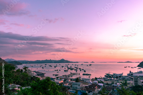 Sunset on Labuan Bajo harbor with purplish sky on East Nusa Tenggara, Indonesia