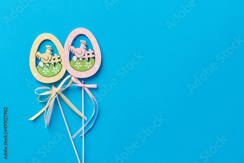 Easter decor in the form of two wooden eggs on a stick