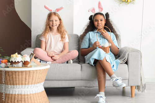 Cute little girls with bunn...