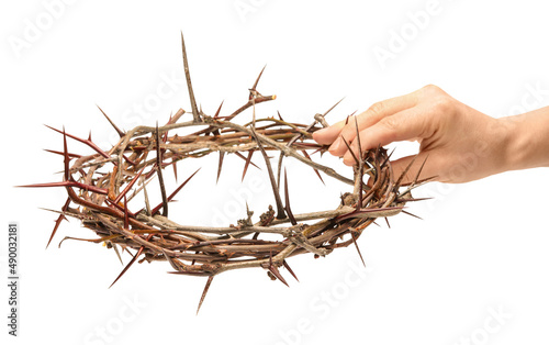 Fényképezés Hand with crown of thorns on white background