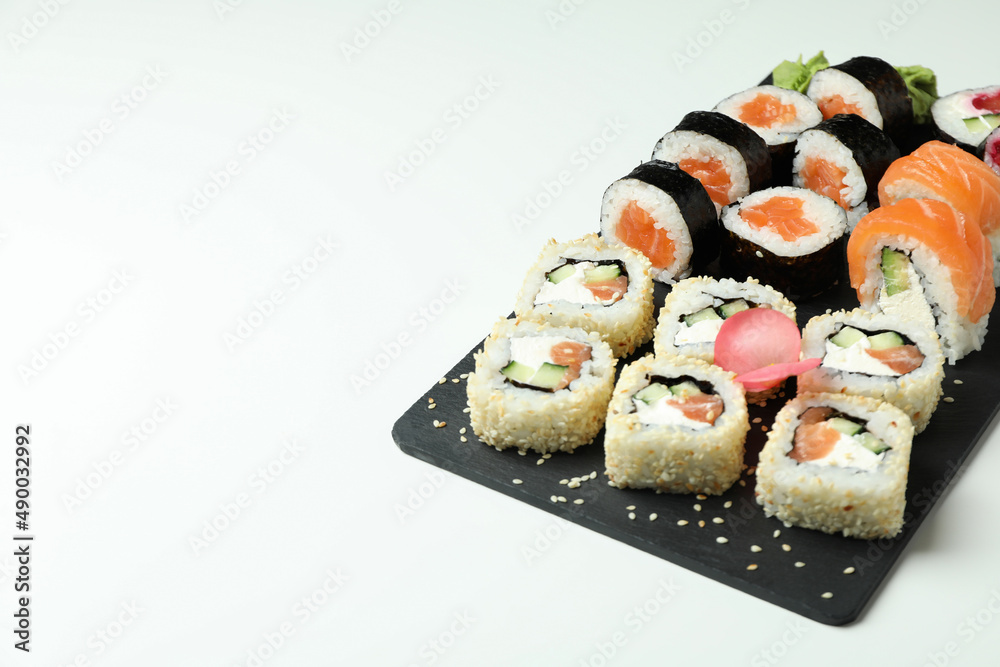 Concept of tasty food with sushi, space for text Concept of tasty food with sushi, space for text