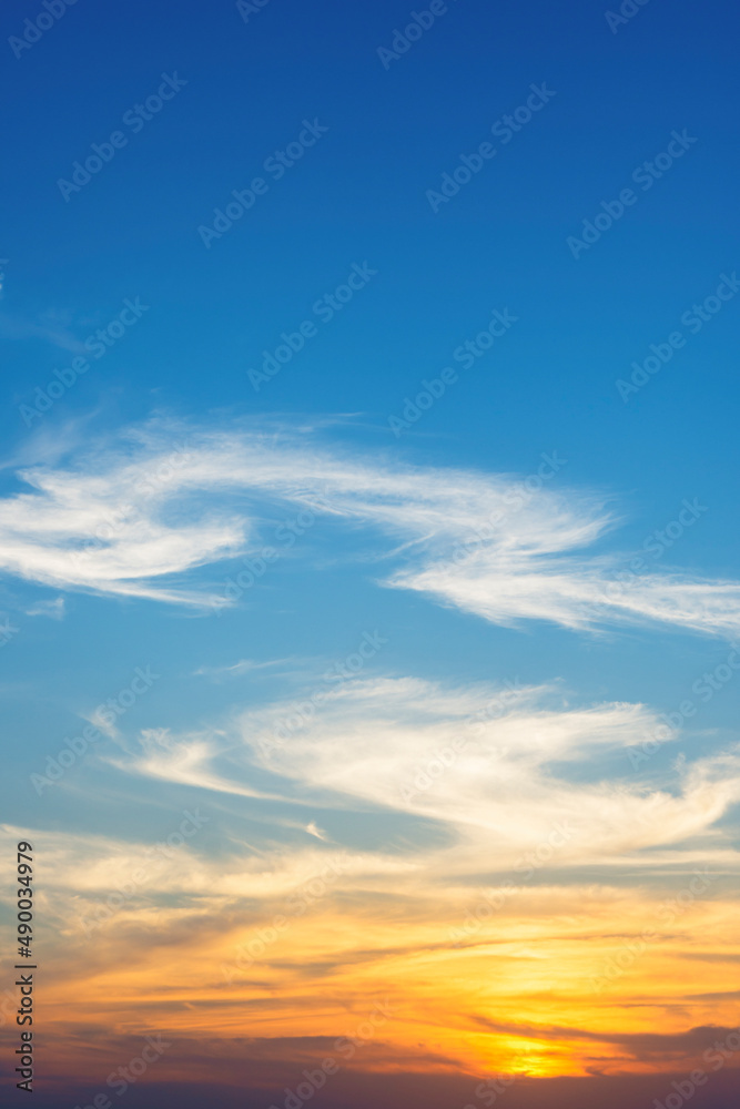Sky with clouds at sunset background