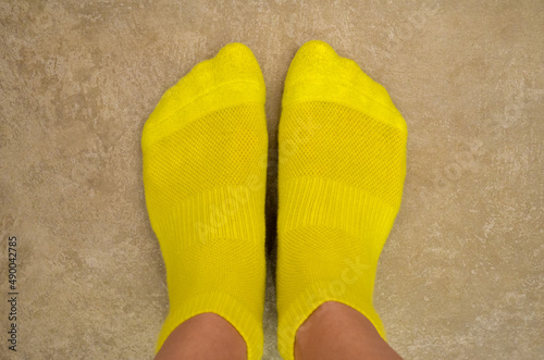Yellow socks close-up, top view