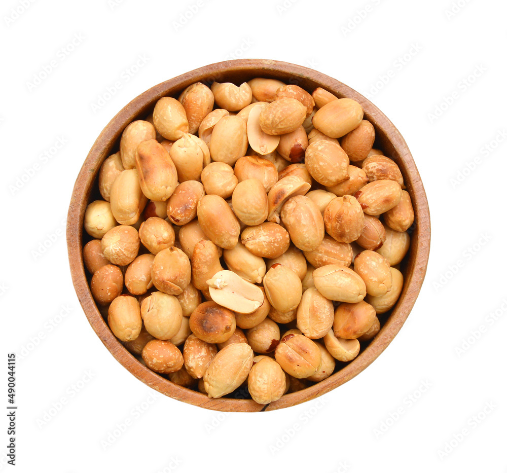 Dried peanuts in closeup on white Dried peanuts in closeup on white