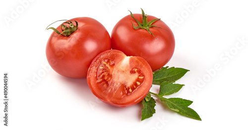 Fresh tomatoes, close-up, isolated on white background.