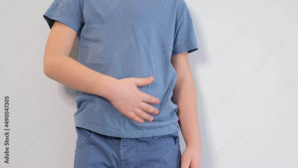 little boy experiences abdominal pain. Baby's medication and health