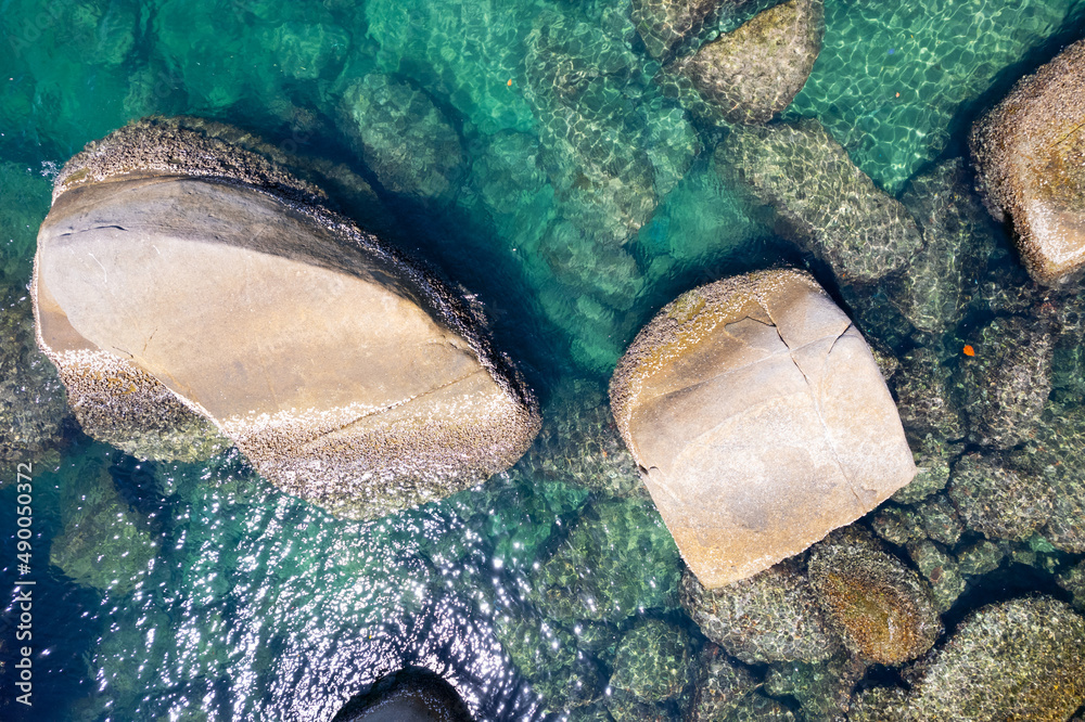 Aerial view Top down seashore rocks sea surface in sunny day Good weather day summer background Aerial view Top down seashore rocks sea surface in sunny day Good weather day summer background