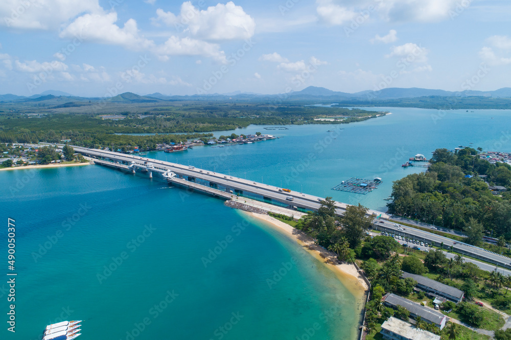 Aerial view of Sarasin bridge road transportation background concept The bridge is a between Phang Nga and Phuket island Thailand The bridge is the most important in making business and transportation Aerial view of Sarasin bridge road transportation background concept The bridge is a between Phang Nga and Phuket island Thailand The bridge is the most important in making business and transportation