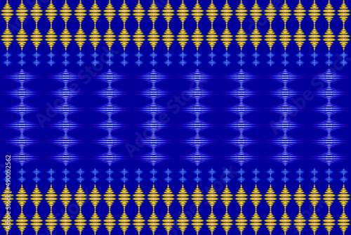 seamless geometric ethnic fabric pattern,blue and gold floral pattern,for fabric print,batik,wallpaper,curtain,cushion,clothing,wrap,blue background