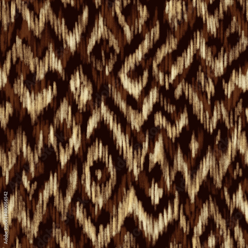 Abstract seamless pattern in earth tones. Spring Summer 2023 fashion trend print for fabric. Block print, batik, earthy inks, wax prints, brush strokes imitation.