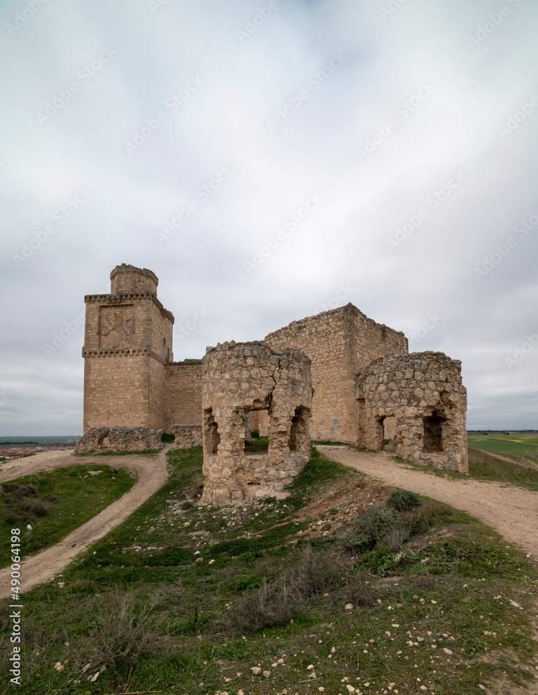 An abandoned castle with several access roads