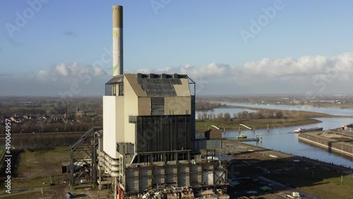 Old coal fired power station and new wind turbines, Netherlands photo