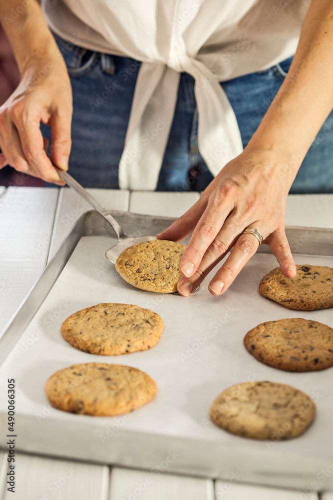 hands of a person preparing cookies hands of a person preparing cookies