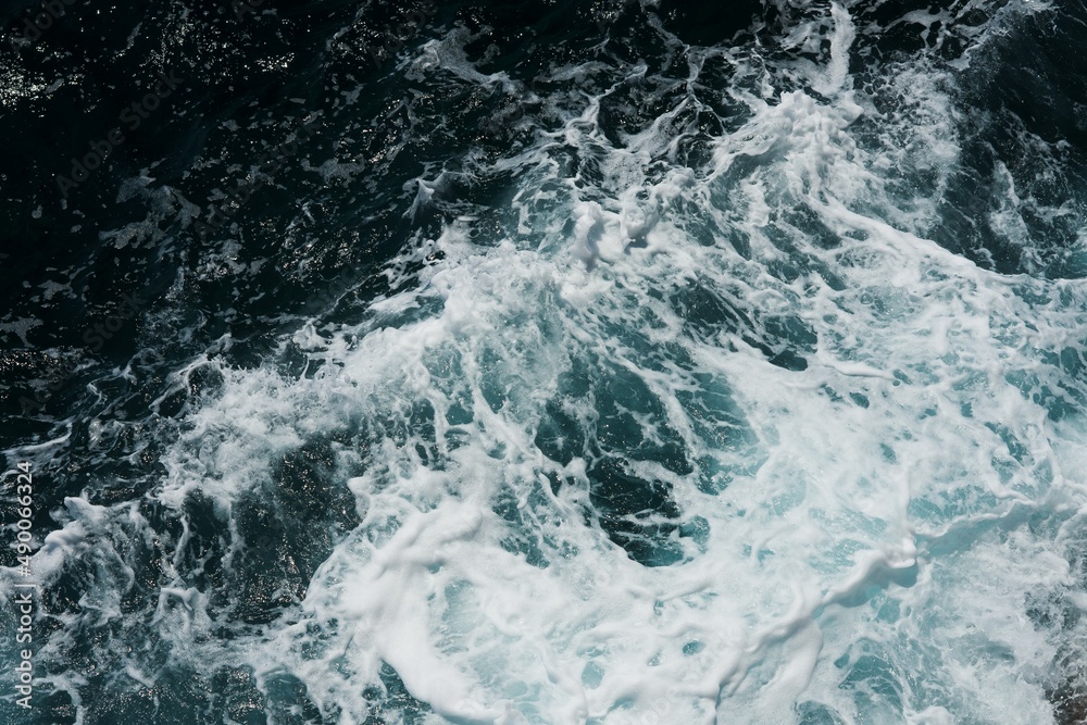 Sea waves, water detail, tide at sklalisk. Sea water in Mallorca, Spain.