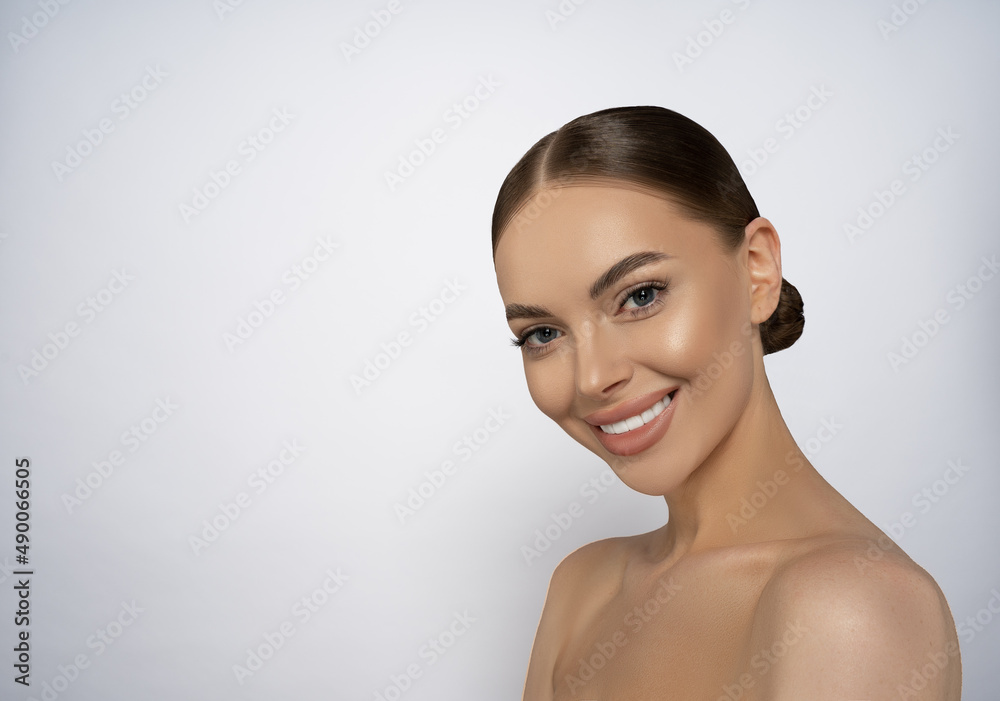 Beautiful young woman with clean fresh skin look away. Girl beauty face care. Facial treatment. Cosmetology, beauty and spa. Beautiful young woman with clean fresh skin look away. Girl beauty face care. Facial treatment. Cosmetology, beauty and spa.