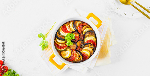 Step 5. Different vegetables. A healthy diet. Ingredients for baking. Vegetable ratatouille on a white background. Top view