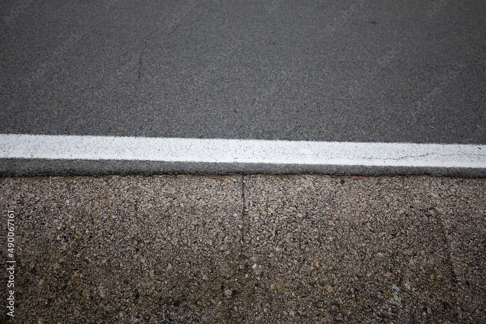 Fototapeta premium asphalt road surface and ditch texture with lines