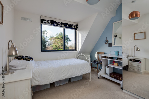 Bright white and blue bedroom