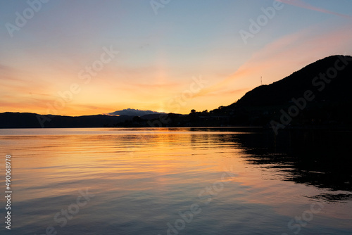 Sunset evening view, Norway, Rosendal, Norwegian fjords sea mountain landscape