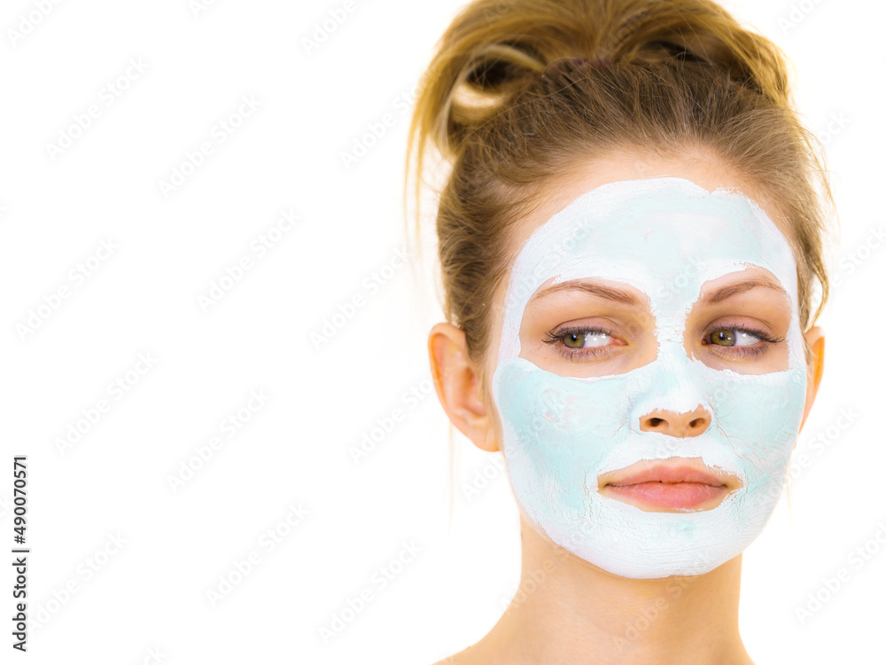 Girl with green mud mask on face Girl with green mud mask on face