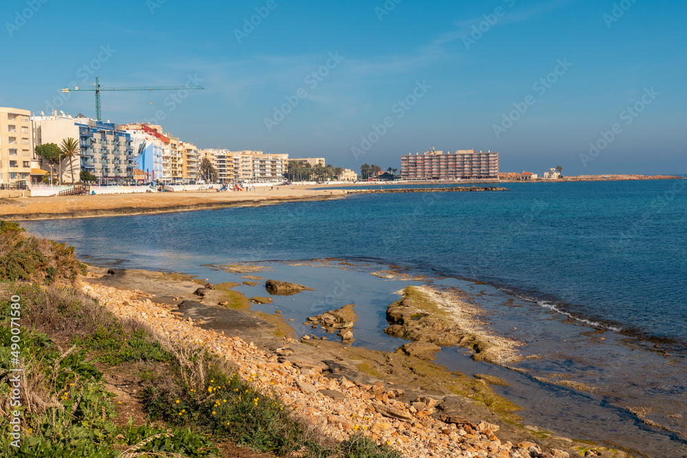 Playa de los Locos in the coastal town of Torrevieja next to Playa del Cura, Alicante, Valencian Community. Spain, Mediterranean Sea on the Costa Blanca