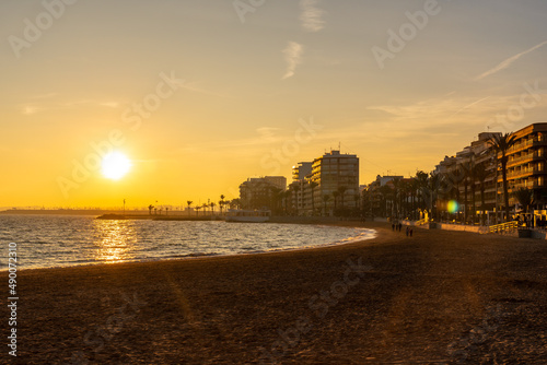 Sunset at Playa del Cura in the coastal city of Torrevieja, Alicante, Valencian Community. Spain, Mediterranean Sea on the Costa Blanca © unai